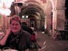Libbi dines under the arches (43K)